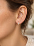 Petite evil eye huggie hoop earrings with CZ detailing
