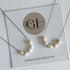 Pearl necklace on a card with Golden Luxe Jewellery branding