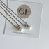 Two pearl necklaces on a card with GLDN Luxe Jewellery branding.