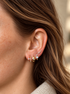 Celeste celestial starburst huggie earrings with sparkling CZ stones