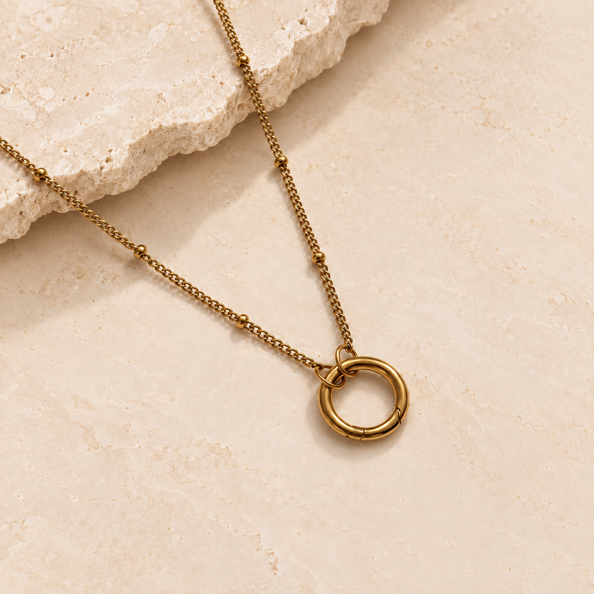 Gold dotty carabiner necklace with beaded chain and round clasp
