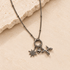 Silver dotty carabiner necklace personalised with starburst, heart and balloon dog charms