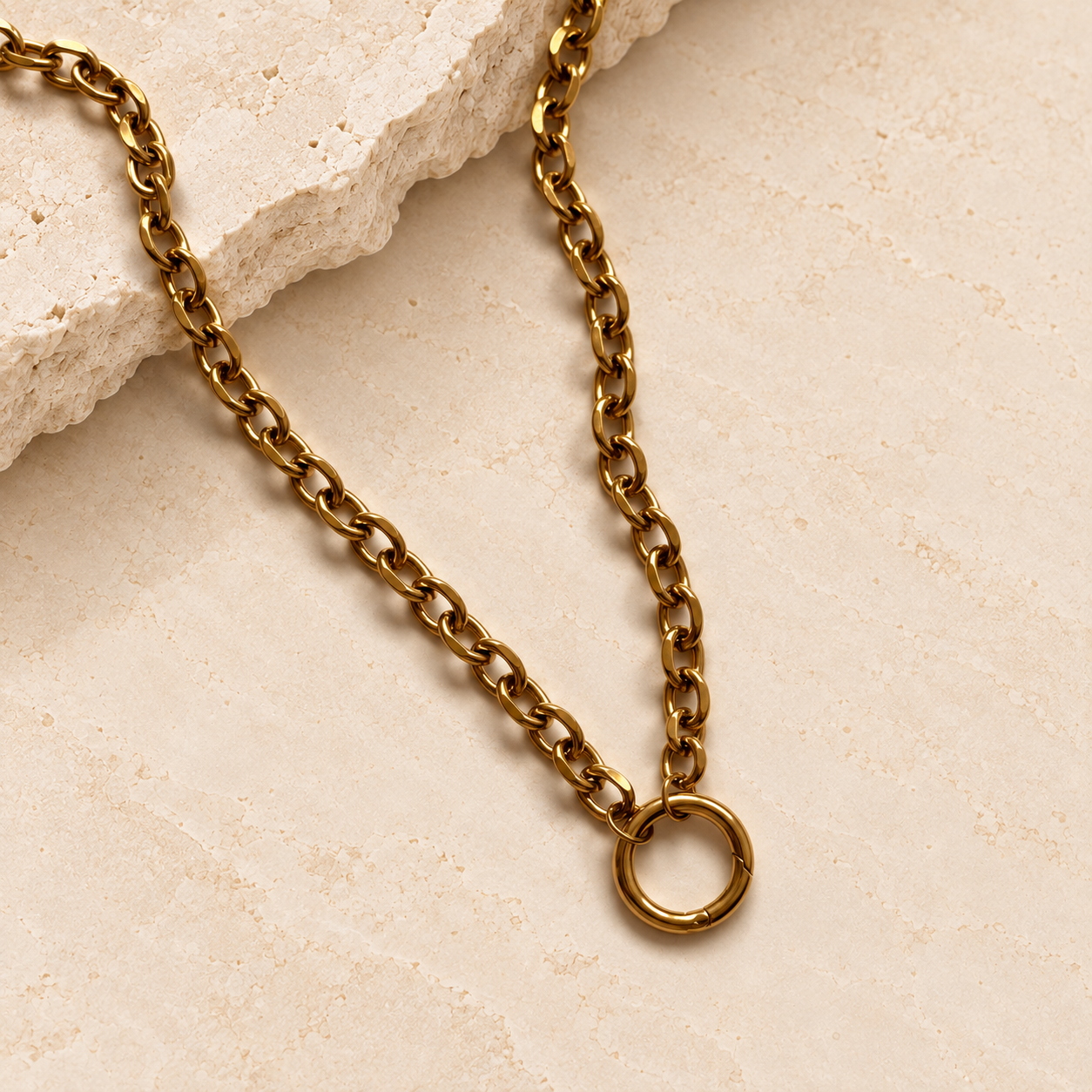 Gold chunky carabiner necklace with statement chain and round clasp