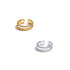 Gold and silver open rings with embedded stones on a white background
